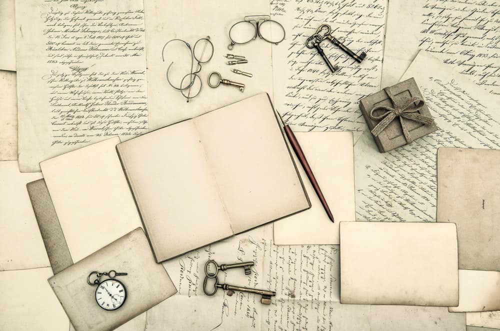 vintage-office-accessories-book-handwritten-letters